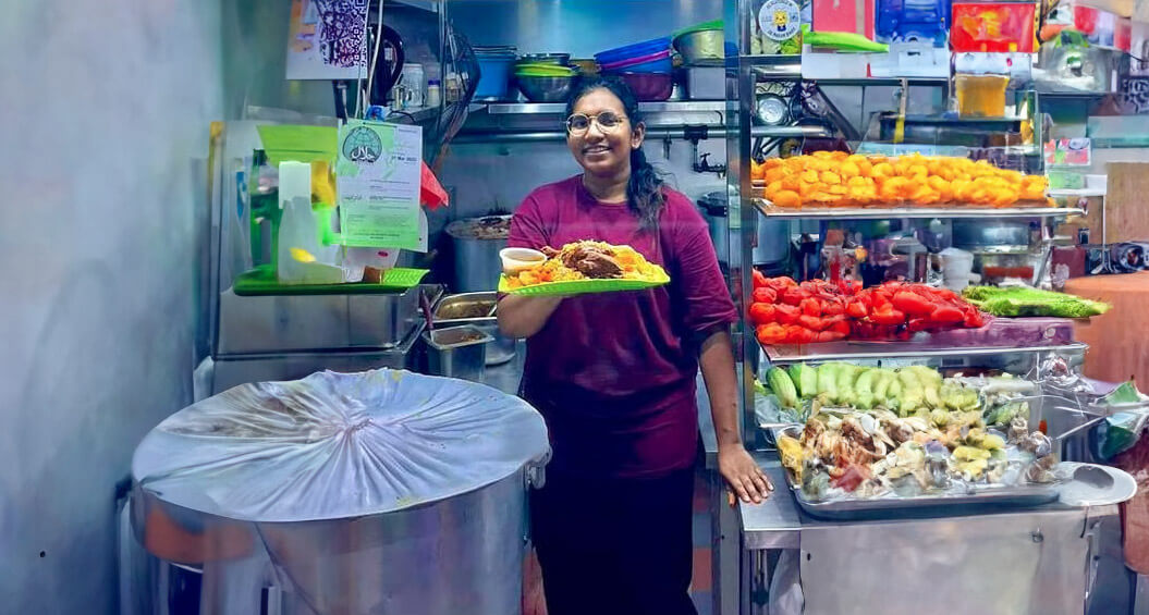 RP alum, Nisha C, helping out at her father's hawker stall