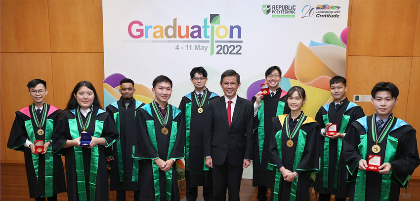 Minister Chan with graduates