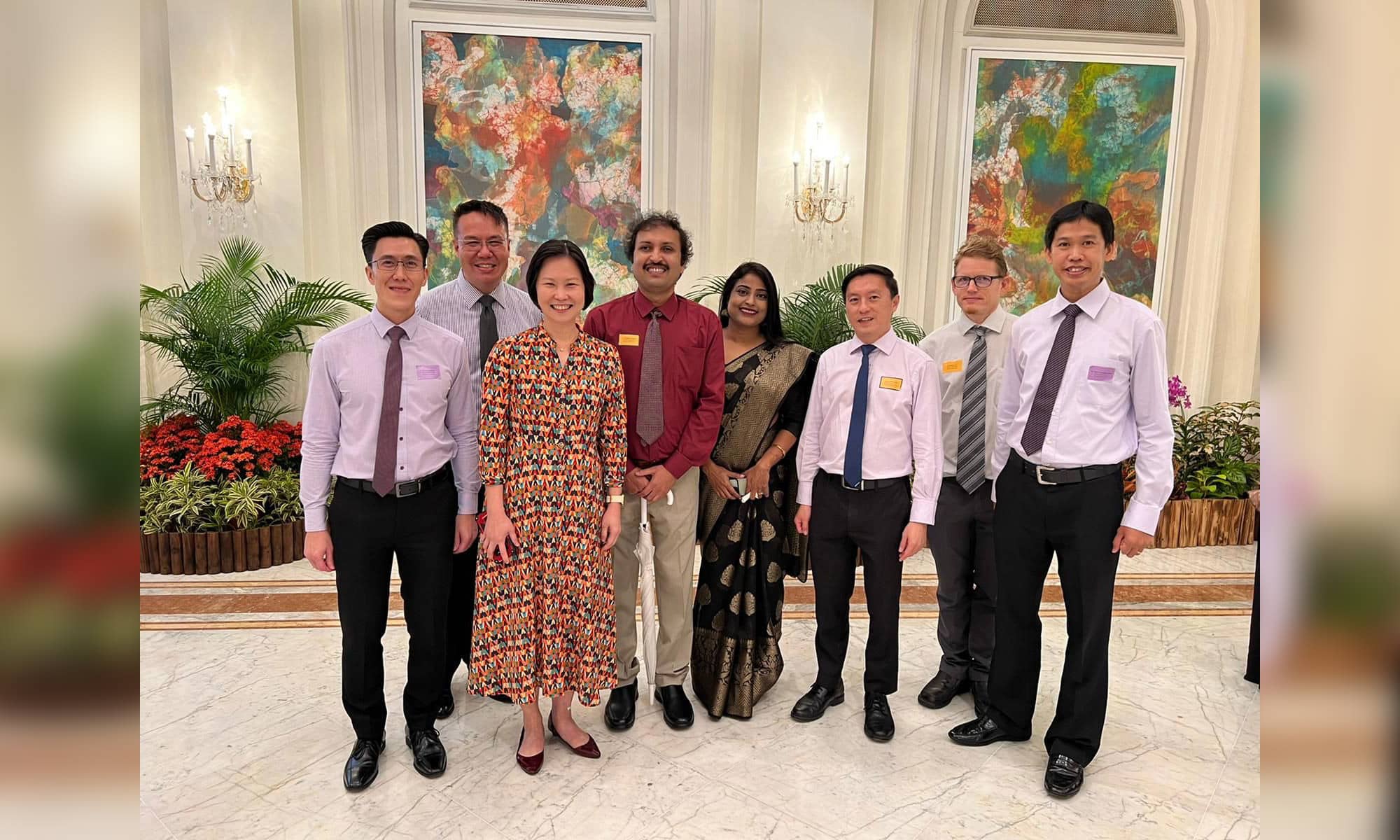 Dr Chiradip and RP lecturers with MOS Gan Siow Huang at the Istana