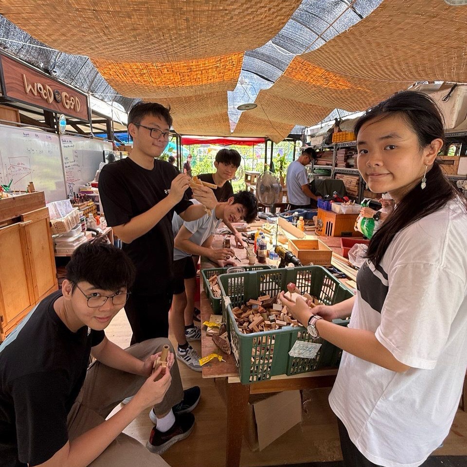 RP student Amber Bek volunteering with Ground Up Initiative as part of the Designing Your Impact (DYI) module, creating sustainable projects for the community.