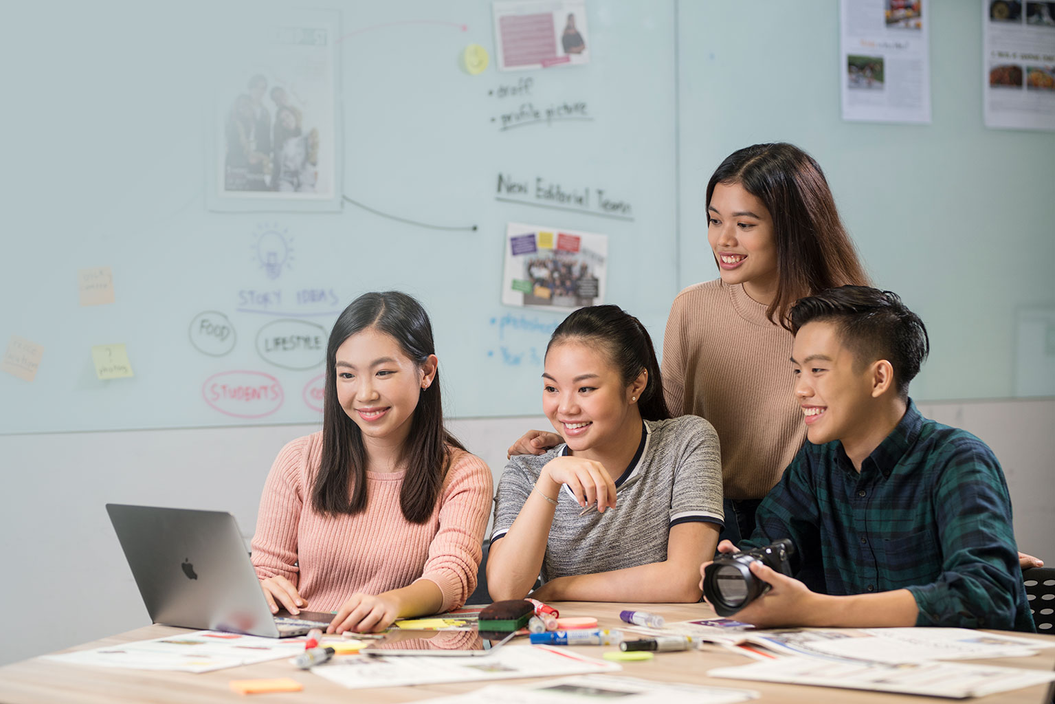 A group of students in a media lab