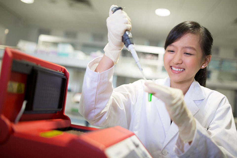 A female student scientist in a science lab
