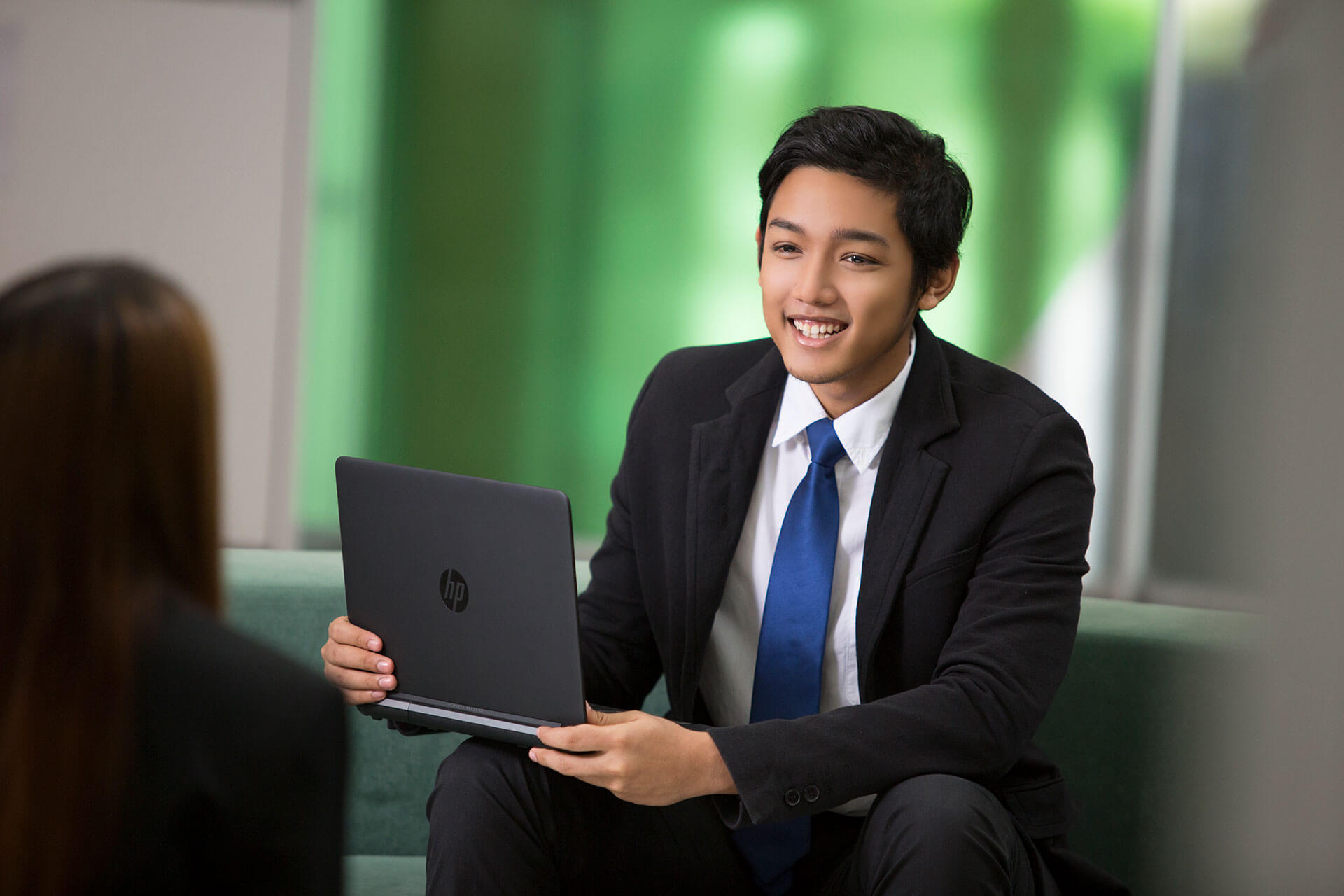 A smartly-dressed student attending a face-to-face interview