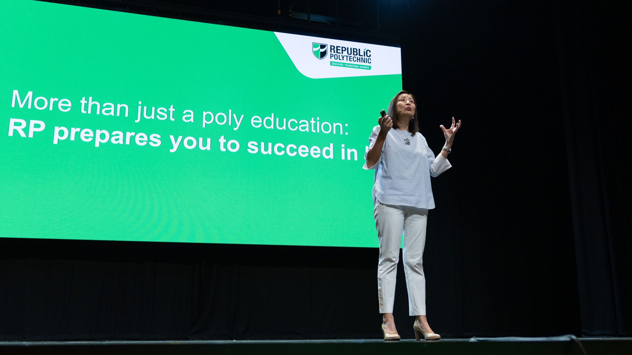 Ms Jeanne Liew, Principal & CEO of Republic Polytechnic giving an admissions talk on stage