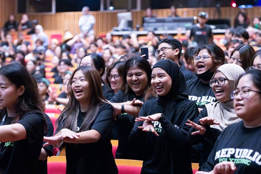 Happy students performing a dance at the TRCC