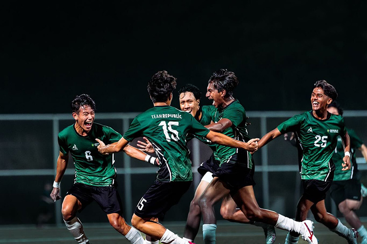Team Republic Soccer Team celebrating after scoring a goal