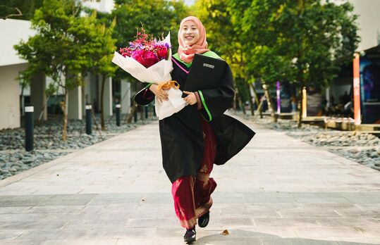 Maria Zahid celebrating her graduation