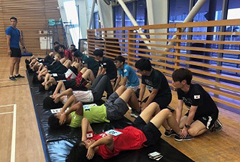 School of Applied Science, Year 2 students doing sit-ups_SAS challenge_slider