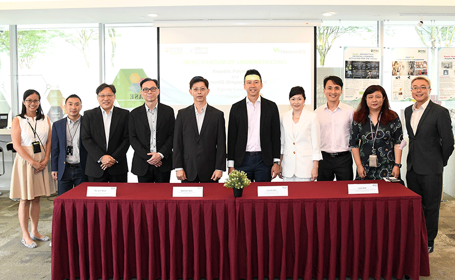A group photo of the representatives from RP and NielsenIQ at the MOU signing ceremony.