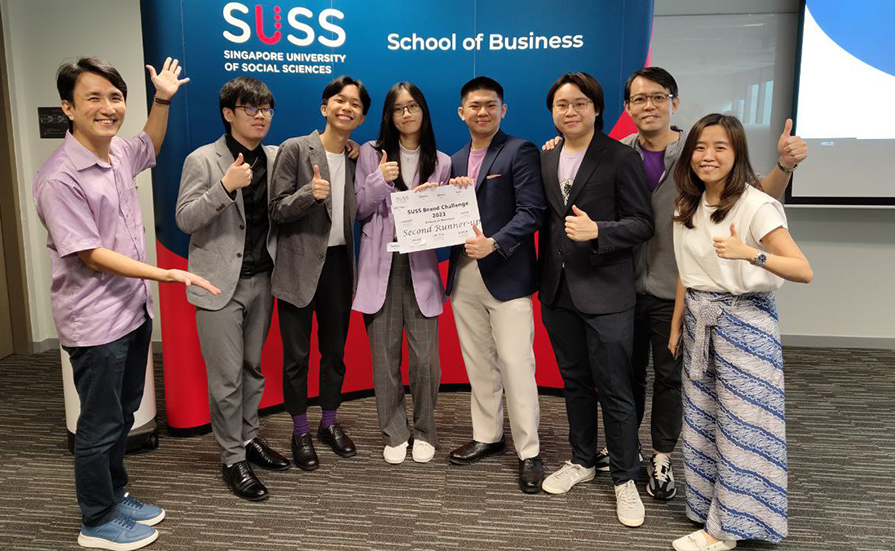 Third place winners of the SUSS Brand Challange 2023 with one of their mentors Mr Shawn Tay, joined by SMC staff Ms Terri Tan and Programme Chair Joshua Yeo.