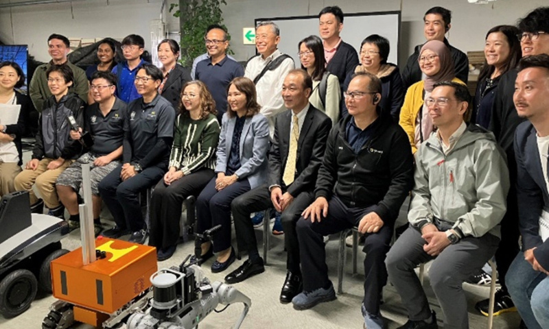 SingaporeparticipantsvisitedHappyQualitysfarmforademonstrationonitsroboticscapability